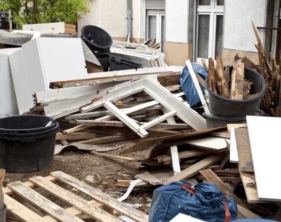 Construction debris removal - pile of construction waste and materials