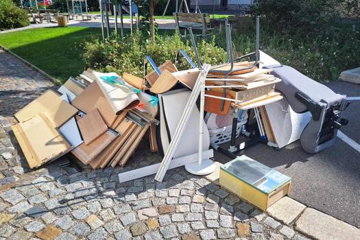Household junk removal - pile of furniture and items ready for pickup